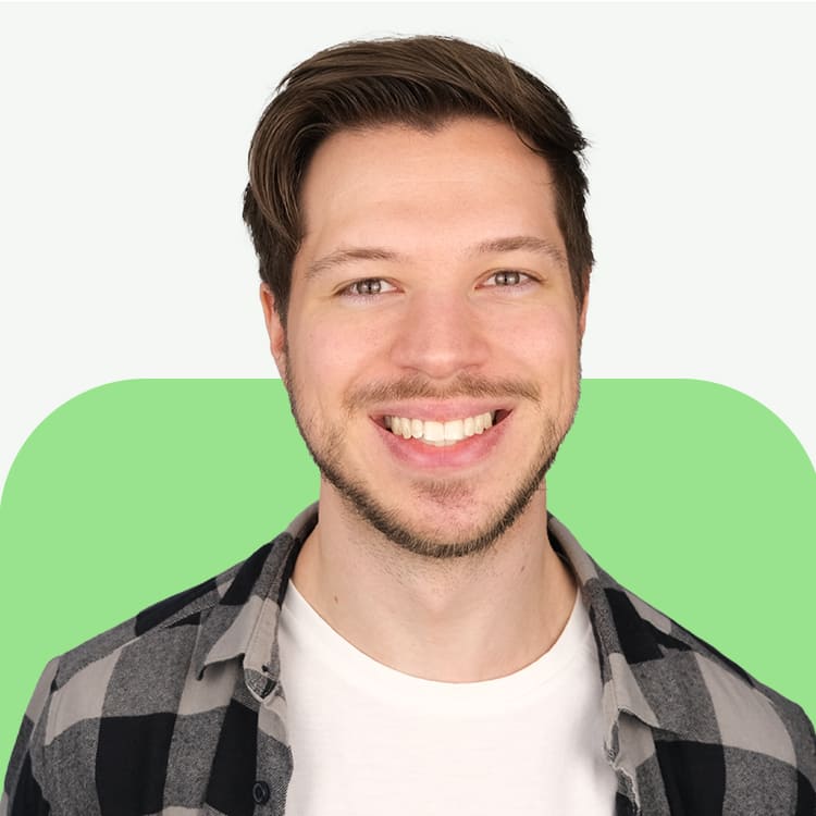 Julien Eschert, Full Stack Developer, auf einem professionellen Porträtfoto